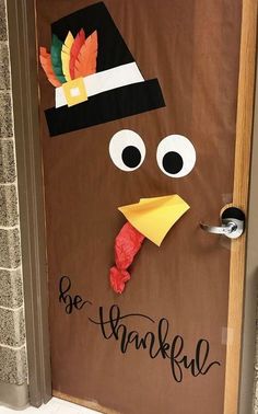 a door decorated to look like a thanksgiving turkey