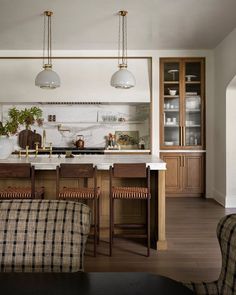 the kitchen is clean and ready to be used as a dining room or living room