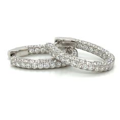 These oval diamond hoop earrings have been given a stylish touch with an elegant round cut diamonds placed inside and out. 18K white gold hoop earrings are set with 3.98carats 3 rows round diamonds. Every woman can always use a pair of classic diamond hoop earrings to add to their wardrobe. Accessorize with these hoop earrings for fun and casual looks, or formal occasions where you want the focus to be on your outfit.Metal: 18K White GoldDiamond Weight: 3.98ct t.w.Diamond Shape: 138 Round brilli White Gold Hoop Earrings, White Gold Hoops, Oval Hoop Earrings, Diamond Hoop Earrings, Ear Loop, Rose Gold Earrings, Diamond Shape, Oval Diamond, Gold Hoop