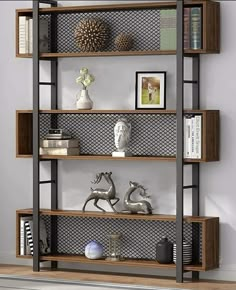 a book shelf with books and pictures on it in a living room or dining room