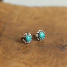 These .925 Sterling Turquoise Post earrings are the perfect size and just the right amount of detail - a boho jewelry staple! Two, graduated .925 Sterling Silver twist wires embellish the Turquoise stones and are the perfect accent for what we call our Western Turquoise Posts. They are available in the shop in many stones. Just a perfect little design ... why not spread the love. Post earrings are a staple of any jewelry wardrobe. These posts are the quintessential turquoise studs -- gorgeous, n Bohemian Turquoise Earrings Stamped 925, Western Turquoise, Boho Turquoise, Blue Stud Earrings, Jewelry Wardrobe, Jewelry Staples, Turquoise Stud Earrings, Pink Studs, Sacred Stones