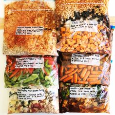 four bags filled with different types of vegetables on top of each other and labeled with labels