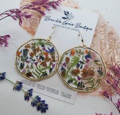 Beautiful garden confetti earrings from my June 2021 collection. These beauties are an irregular round shape (which makes them unique) with several different tiny blooms preserved in high quality resin. Nickel free earring hooks for sensitive ears. Nature Inspired Accessories, Woodland Earrings, Flower Confetti, Earrings Nature, Jewelry Beautiful, Nickel Free Earrings, Botanical Jewelry, Tropical Style, Pressed Flower