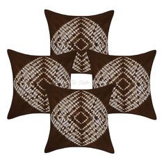 four brown and white decorative pillows on a white background with an image of the same pattern