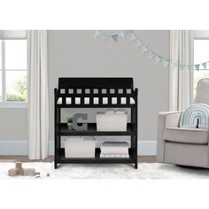 a baby crib in the corner of a room