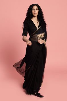 Black saree with floral, bird embroidered motifs. Paired with V-neck blouse.
Component: 2
Embroidered
Neckine: V neck
Sleeve Length: Short
Fabric: Chiffon Silk
Color: Black
Floral motif work - Aza Fashions Label Earthen, Black Saree Blouse, Black Blouse Designs, Fashionable Saree, Saree Blouse Styles, Cotton Saree Blouse Designs, Simple Saree Designs, Saree Wearing Styles, Fashionable Saree Blouse Designs