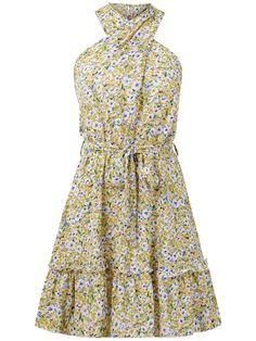 This floral mini dress will make you stand out at any summertime event. Its halter neckline and vibrant yellow color add a playful touch, while its lightweight fabric keeps you cool and comfortable. Perfect for making a statement without taking yourself too seriously. Size Guide: Demi is 5’65” tall, and has a 33.6” bust, 24.1” waist, & 35.2” hips. She is wearing a S / US 4 / AU 8. This dress is true to size. Material: 100% Viscose. Feature: Halter neckline. Sleeveless. Waist tie. Floral prints. Mini length. Relax fit. Care Instructions: Machine wash / Cold hand wash Spring Halter Mini Dress For Summer Parties, Yellow Floral Dress For Summer Garden Party, Floral Print Halter Sundress For Summer Parties, Yellow Floral Sundress For Beach, Yellow Floral Sundress For The Beach, Yellow Sleeveless Halter Sundress, Summer Halter Neck Floral Dress For Brunch, Summer Floral Halter Neck Dress For Brunch, Yellow Sleeveless Halter Dress For Summer