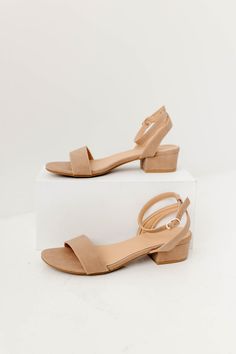 Keep it classy with the 'Vienna' Heels! These block heels sandals are comfortable and easy to walk in which makes them the perfect option for your next event or photoshoot. Take your outfits to new heights with these chic sandals! 1.5" Heel Height Tan Flat Sandals, Bridesmaid Sandals, Fancy Sandals, Block Heel Mules, Footwear Design, Simple Sandals, Beige Heels, Chic Sandals, Sandals Flat