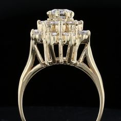 Description: This exquisite vintage diamond ring, crafted in the 1950s, features a unique flower-shaped design set in 14K yellow gold. The ring boasts a round diamond center stone of H color and SI1 clarity, surrounded by 8 smaller round diamonds of G color and SI1 clarity. The high-quality materials, exceptional craftsmanship and unique design make this ring a true treasure from the 1950s. Its timeless elegance and vintage charm make it a perfect heirloom piece. Specifications: Weight: 5.9 gram Vintage Diamond Flower Ring In Gold, Vintage Gold Diamond Flower Ring, Vintage Brilliant Cut Flower Ring For Formal Occasions, Classic Yellow Gold Flower Ring With Center Stone, Art Deco Yellow Gold Cluster Ring With Center Stone, Vintage Flower Ring With Brilliant Cut For Formal Occasions, Vintage Yellow Gold Cubic Zirconia Ring, Vintage Diamond Flower Ring For Formal Occasions, Gold Retro Diamond Ring For Formal Occasions