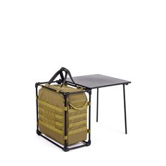 a folding table with a bag on it