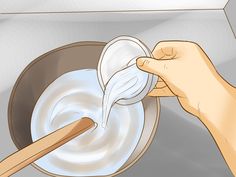 a person is pouring milk into a bowl