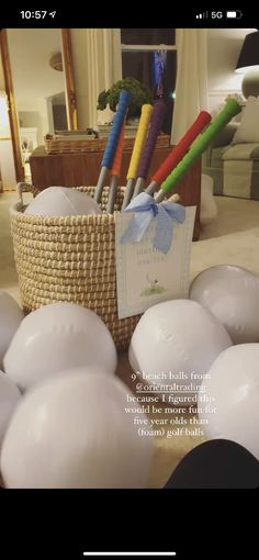 balloons in a basket with a note attached to it