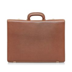 This briefcase from Gucci is made of brown leather. It is carried by a handle in the hand and offers an exterior zippered compartment, gold-tone combination lock and interior pockets. The perfect companion to work! Gucci Tote Bag, Gucci Tote, Contemporary Eclectic, Gucci Leather, Leather Briefcase, The Hand, Vuitton Bag, Diaper Backpack, Casual Backpack