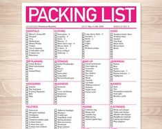 the packing list is shown on a wooden table with pink lettering and white paper in it