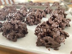 chocolate cookies are on a cookie sheet ready to be eaten