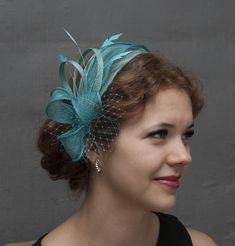 Teal fascinator. Elegant wedding fascinator, where I have used two shades of teal fabrics next to each other. Will be made to order according to your wishes at what side of your head you want to wear it. Choose your option from the variations. Choose your attachment option also from the variations. Available options are following: Clip; Comb, Silver metal headband, Golden metal headband, Black metal headband or fabric covered headband (same fabric the fascinator is made from) SHIPPING: Shipped f Teal Fascinator, Butterfly Headpiece, Wedding Reception Planning, Mini Hats, Bridal Fascinator, Black Fascinator, Metal Headband, Headband Black, Turquoise Wedding