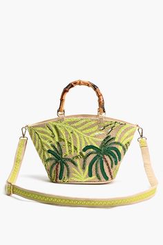 Hand-held tote Durable bamboo looking handles Medium size tote Detachable and adjustable long straps with lace detailing Embellishments with beads in front Made in cotton jacquard with a hint of gold lurex Magnetic button closure Lined interiors with zip pocket and a mobile pocket Size: 15" x 9" x 4.5" The Palm Tree Beaded Mini Tote is a chic and versatile accessory that combines style with functionality. 

 This hand-held tote is designed with durability in mind, featuring bamboo-looking handl Leopard Bag, Embellished Bags, Tassel Jewelry, Small Pouches, Beach Tote Bags, Mini Tote, Bag Dress, The Palm, Pocket Size