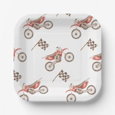 a paper plate with an image of a dirt bike on it