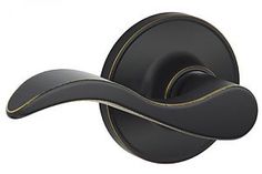 an image of a black door handle on a white background