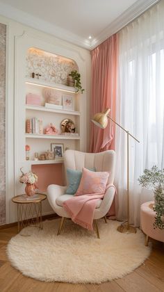 a living room with pink and white decor