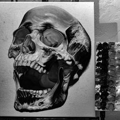 a black and white drawing of a skull