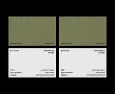 two green and white business cards sitting on top of each other in front of a black background