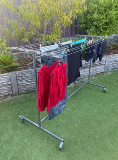 clothes are hung out to dry in the backyard