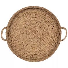 a round placemat with handles made out of jute and braided in natural colors