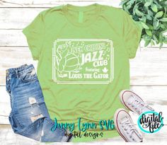 a green t - shirt with the words jazz club and an image of a cat on it