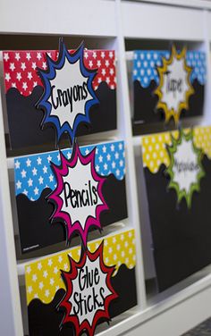 some colorful bulletin board with writing on them