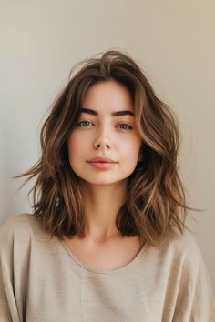 24 Gorgeous Medium-Length Layered Haircuts for Every Hair Type in 2024 – CreativeBooster Medium Short Layered Haircuts, Choppy Layers For Medium Hair, Layered Shoulder Length Bob, Shoulder Length Bob With Layers, Collarbone Length Hair, 2024 Hair Trends, Shoulder Length Layered Hair, Layered Thick Hair, Feathered Layers