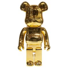 a gold colored bear is standing upright