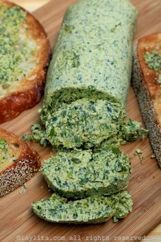 there are several pieces of bread with pesto on it