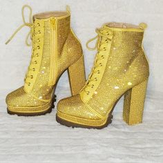 Beautiful Yellow Faux Suede 4.75" Heel With A 1.5" Platform Deep Lug Tread Adjustable Lace Up Front Design With A Easy To Use Side Zipper New In Box Pictures Taken With And Without Flash Yellow Heels With Rhinestones For Party, Gold Heels With Rhinestones And Round Toe, Gold Rhinestone Heels With Round Toe, Yellow Rhinestone Heels For Party, Party Yellow Heels With Rhinestones, Yellow Rhinestone Party Heels, Yellow Round Toe Heels For Party, Yellow Lace-up Platform Boots, Yellow Embellished High Heels