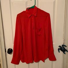 Red See Through Guess Button Up With Crystal Buttons At The Neck And Wrists, It Also Has A Front Pocket With A Gold Guess Place. Red Long Sleeve Office Top, Red Long Sleeve Top For Office, Red Office Shirt For Fall, Red Shirt For Office In Fall, Red Shirt For Office Wear In Fall, Red Long Sleeve Office Shirt, Red Button Closure Blouse For Fall, Fall Red Blouse With Button Closure, Red Shirt For Workwear In Fall