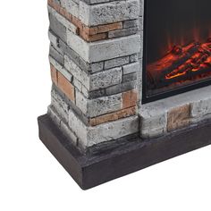 a brick fireplace with an electric fire in the center and red flames coming from it