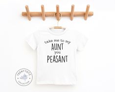 Teeny Totz threads are 100% designed, printed, pressed and shipped (next business day!) to you from our boutique.  We use high quality products that are CPSIA certified. BABY ONESIES AVAILABLE IN NB  | 6M  | 12M | 18M | 24M * 100% combed ring-spun cotton fine jersey * Heather is 90/10 combed ring-spun cotton/polyester * Flatlock-stitched seams * Double needle stitched ribbed binding * Metal free snaps * Side seam construction * CPSIA compliant INFANT & TODDLER T-SHIRTS AVAILABLE IN 6M | 12M | 18 Aunt And Baby Matching Shirts, Aunt Shirts For Babies Boys, Take Me To My Aunt You Peasant Onesie, Telling Niece And Nephew Your Pregnant, Funny Aunt Onesie, Aunt Baby, To My Aunt, Baby Aunt, Funny Baby Clothes