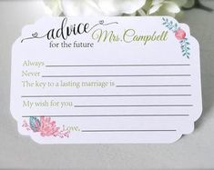 wedding advice card with flowers on it