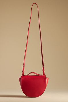 This one is a keeper: Elodie by Clare V. is the perfect size for carrying the essentials, featuring a top handle and removable crossbody strap. | Elodie Crossbody Bag by Clare V. in Red, Women's, Leather at Anthropologie Claire V Bags, Red Leather Satchel With Adjustable Handle, Red Satchel With Adjustable Handle For Everyday, Everyday Red Satchel With Adjustable Handle, Red Crossbody Satchel With Adjustable Handle, Red Leather Shoulder Bag With Adjustable Handle, Luxury Red Bags With Adjustable Handle, Red Evening Bag With Adjustable Handle, Red Bags With Adjustable Top Handle