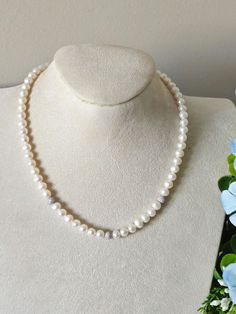 Handmade choker necklace with 6mm white natural pearls with 925 silver beads studded with zirconia. necklace length 45 cm. 925 silver lobster clasp. Handmade Choker Necklace, Zirconia Necklace, Necklace Bridal, White Pearl Necklace, Bridal Necklace, Natural Pearls, White Pearl, Necklace Length, Silver Beads