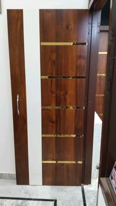 two wooden doors in a room with tile flooring