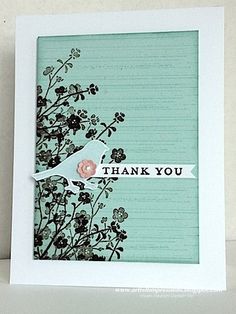 a thank you card with flowers and a bird on the side, in front of a white background