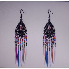 Boho Feather Drop Earrings In Vibrant Colors. 10.5". Bronze Tone Metal. Unique! New In Package. I Ship Out Within 24 Hours On Week Days. Follow Me So You Can Get Some Good Deals ;) Thanks For Stopping By Mimzy's! Pet Friendly Home. **I Don't Smoke But My Husband Does. All My Products Are Upstairs Behind Closed Doors Where He Does Not Smoke. If You Are Allergic Or Sensitive, Don't Buy As Smoke Can Seep In. I List And Immediately Put In A Bag To Prevent Any Possible Smoke Smell.** Festival Tassel Earrings With Fringe, Trendy Multicolor Fringe Jewelry, Trendy Multicolor Fringe Earrings, Peacock-colored Bohemian Earrings For Gift, Multicolor Bohemian Drop Clip-on Earrings, Behind Closed Doors, Medium Hoop Earrings, White Studs, Boho Feathers