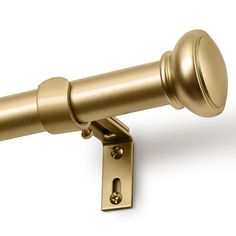 an image of a gold curtain rod on a white background with clippings to the side