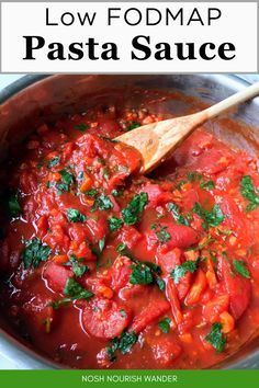 the recipe for low fodmap pasta sauce in a pot with a wooden spoon