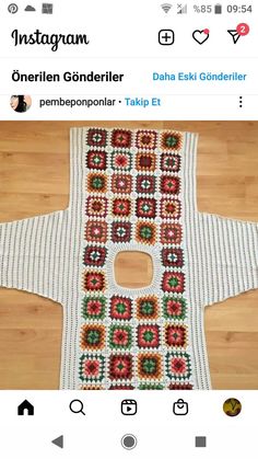 a crocheted table top with an instagramr on it