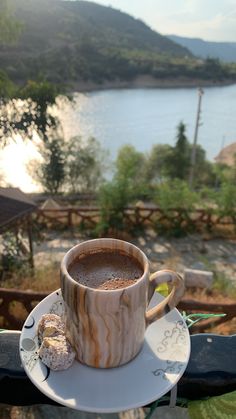 a cup of hot chocolate on a saucer