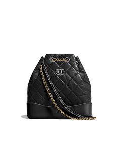 a black chanel bag on a white background