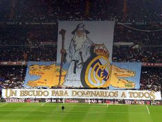 an image of a soccer game being played on the field with fans in the stands