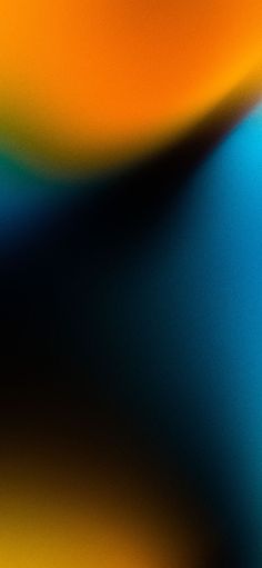 a blurry image of an orange and blue background